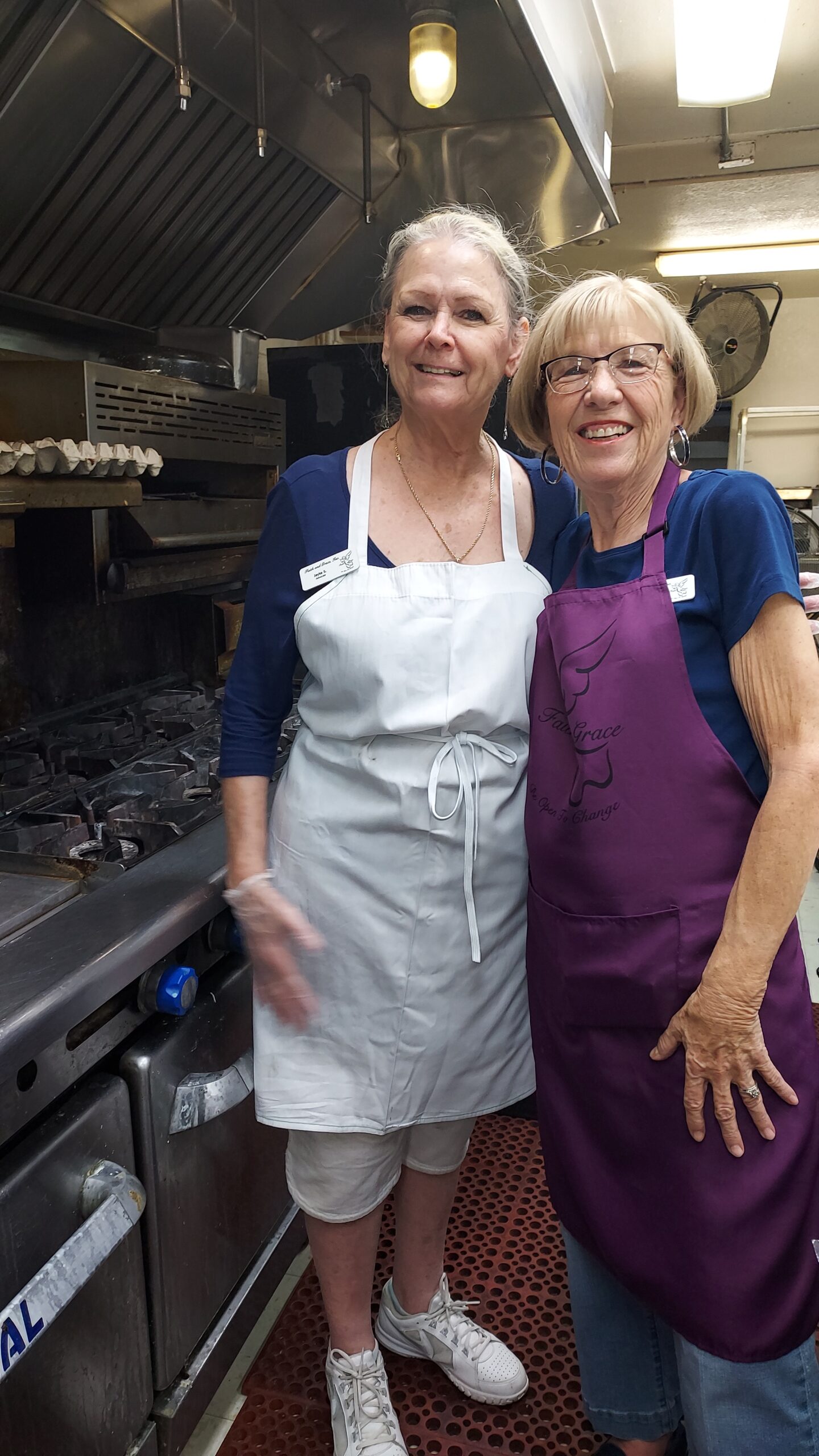 Advocate Jayke Schrengost and Jean McDougall cooking at the Eagles for the May fundraiser